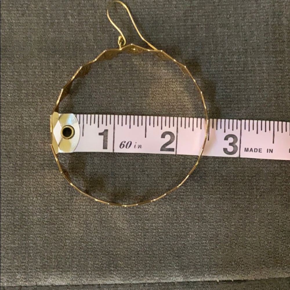 Oversized high shine gold hoop earrings - Picture 7 of 11